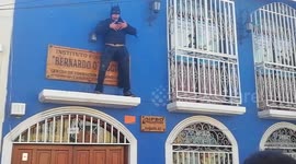 Sensual Batman dances during Chilean march