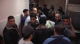 Hundreds mourn deaths of two young men killed in Israeli-Palestinian conflict