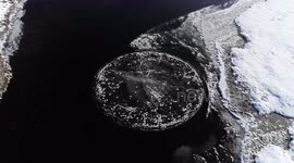 Incredible drone footage captures mysterious spinning ice circle in northern China