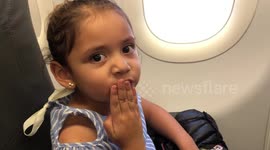 'Can you see grandma Fina?' Sweet little girl believes she's flying along deceased great-grandma on airplane