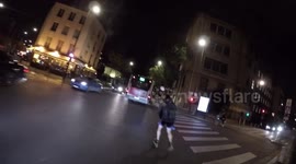 Shocking moment man rollerblades while carrying young child in arms in Paris