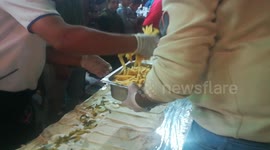 Chefs Putting Ingredients In Longest Free Sandwich In Black Friday Gift