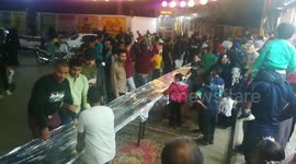 People Gathered In First Live Event '  longest Free Sandwich ' Black Friday Gift