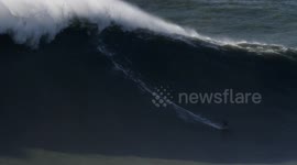 French surfer Justine Dupont 'breaks world record' for biggest wave ever ridden by a woman, conquering 70ft monster in Portugal