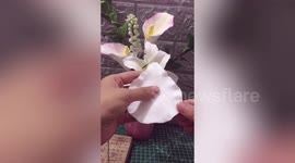 Talented woman sculpts clay into incredibly realistic flowers and plants