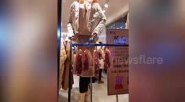 'Buy clothes get pork free!' Chinese clothing shop uses meat as promotional offer