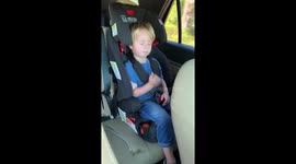 Impressive little boy in Georgia accurately sings a country song half asleep