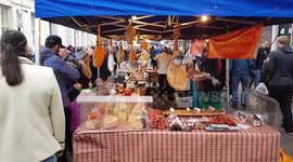 Crowds of Families and Shoppers at St Albans Christmas Street Market, Hertfordshire