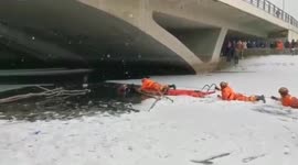 Heroic Chinese firemen rescue mother and son trapped in frozen lake