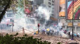 Hong Kong protestors retreat as police fire tear gas