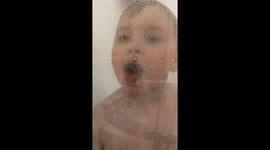 Little boy licks shower screen whilst in the shower do funny!!!