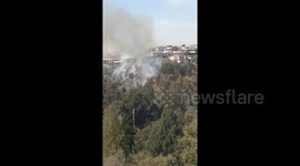 Fires in Chile continue to blaze through hills
