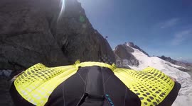 French man ice climbs huge mountain, only to base jump from the top