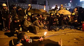 Hong Kong protester misfires flaming petrol bomb from makeshift catapult
