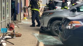 Car drives INTO laundromat in NYC and seriously injures two