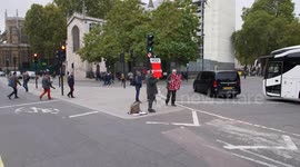 Brexiteers show leave means leave sign to traffic slow motion