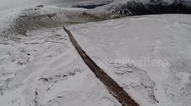 Narrow, icy, muddy road in Northwest Iceland