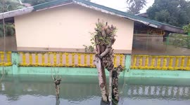 Homes flooded by tropical storm Fung-wong in the Philippines