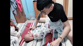 Father makes gibberish sounds to stop baby crying