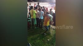 Woman Gets Carried Away Watching Boxing....