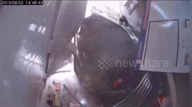 Drunk driver in China smashes car into shop, injuring man and his daughter