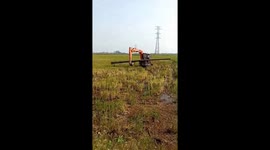 The driver used the excavator to move the concrete poles on the swamp