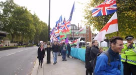 Flags and pedestrians Brexit and EU supporters slow motion
