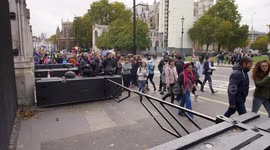 General public pass Brexiteers outside Parliamen
