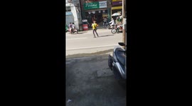 Funky cop dances while directing traffic