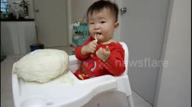 This toddler loves eating raw cabbage