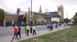 Parliament establishing shot with  Brexit protestors slow motion