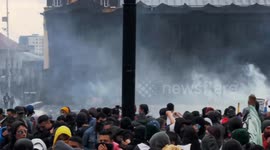 Chaotic scene as hooded protestors hurling bottles storm Colombia's congressional building