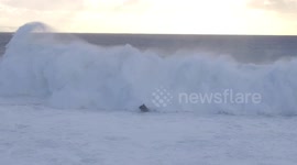 Jet ski driver completes one of the greatest rescues in big wave surfing history (Drone Video with captions)