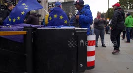 Rising Protestors holding EU flag no deal Brexit slow motion
