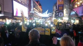 Hong Kong protesters turn on phone torches at Leicester Square