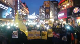 Hong Kong protesters light up London's Leicester Square with glowing mobile phones