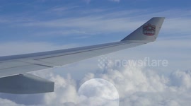A short fantasy trip by airplane, over the moon.