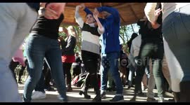 people enjoying latin salsa dancing in parc de la cuitadella, barcelona