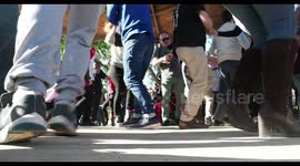 people enjoying latin salsa dancing in parc de la cuitadella, barcelona