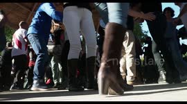 people enjoying latin salsa dancing in parc de la cuitadella, barcelona