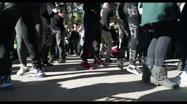 people enjoying latin salsa dancing in parc de la cuitadella, barcelona