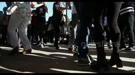 people enjoying latin salsa dancing in parc de la cuitadella, barcelona