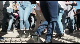 people enjoying latin salsa dancing in parc de la cuitadella, barcelona