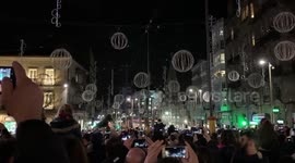 Fake snow sprinkled as Christmas lights are switched on in Vigo, Spain