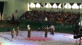 Watch these Vietnam performers' crazy skills tossing hats