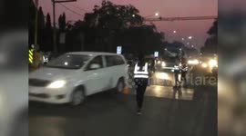 Inspired by India's moonwalking cop, dancing college girl helps spread traffic awareness in central India