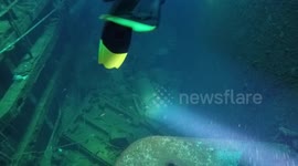 Diving inside the Salem Express. Clothes and belongings of the dead are still located inside