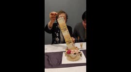 A lot of dough! South Korean grandmother gets endless stream of money inside birthday cake
