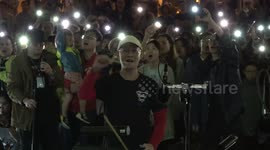 Hong Kong pro-democracy activists take respite from protests with night-time classical music concert in park