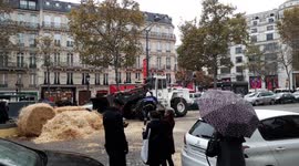 French farmers use tractors to blockade Champs-Elysees in Paris to protest against 'agri-bashing'
